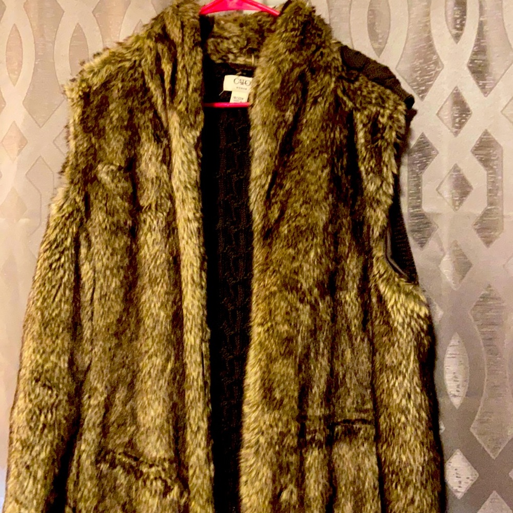 Like new barely worn faux fur and sweater back vest